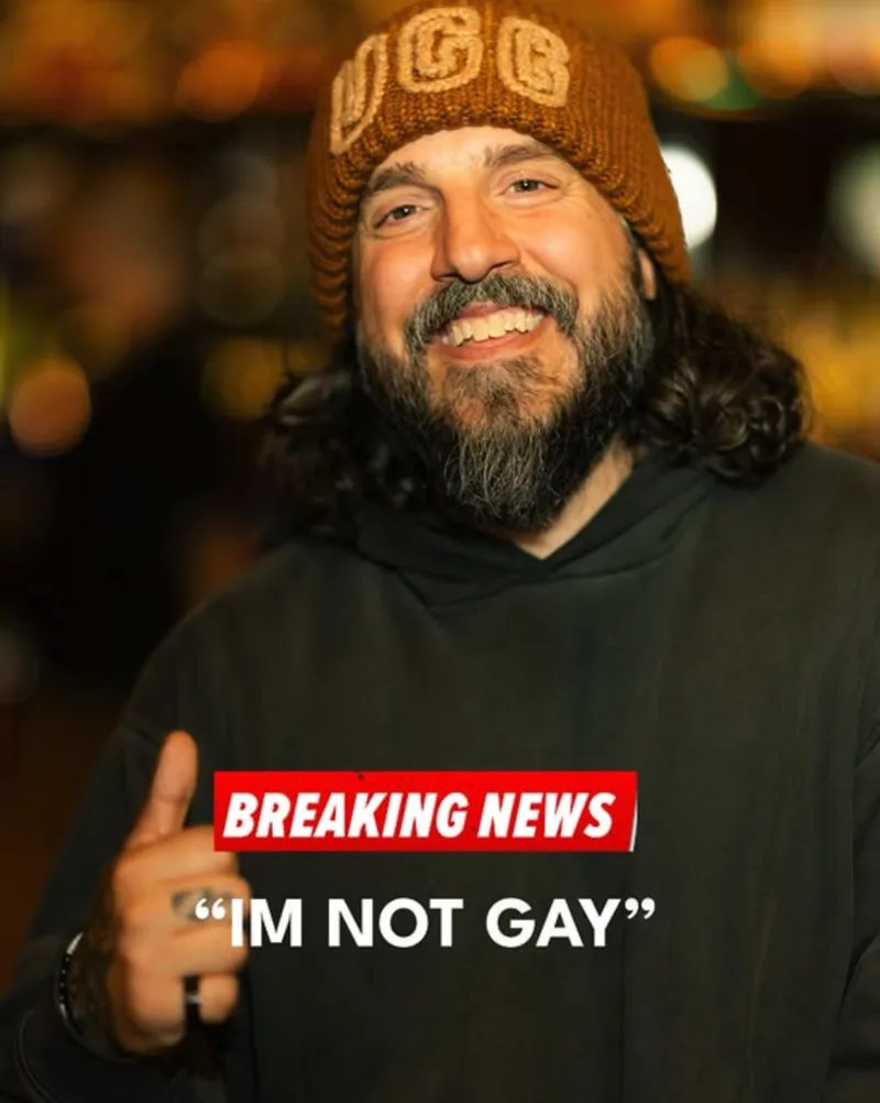 Mike Falzone in a beanie above a breaking-news chyron that reads “I’m not gay”